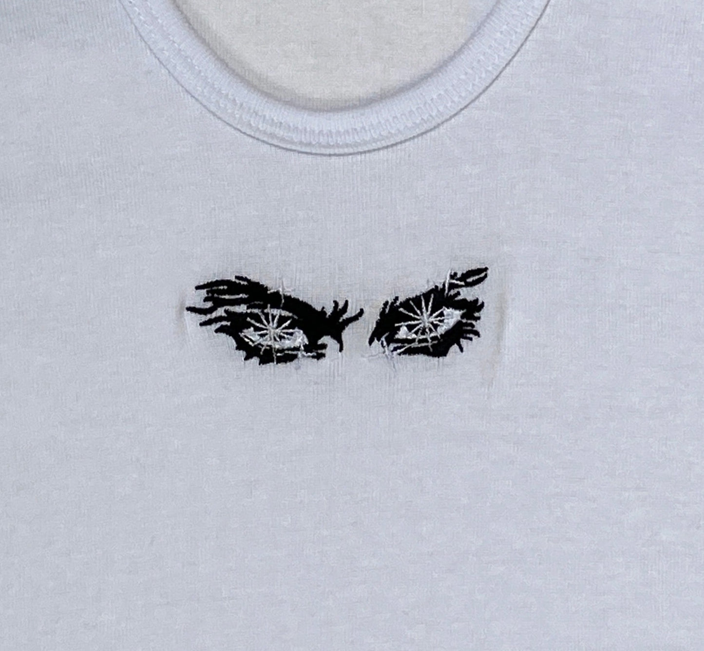 SUDADERA BLANCA OJO POR OJO